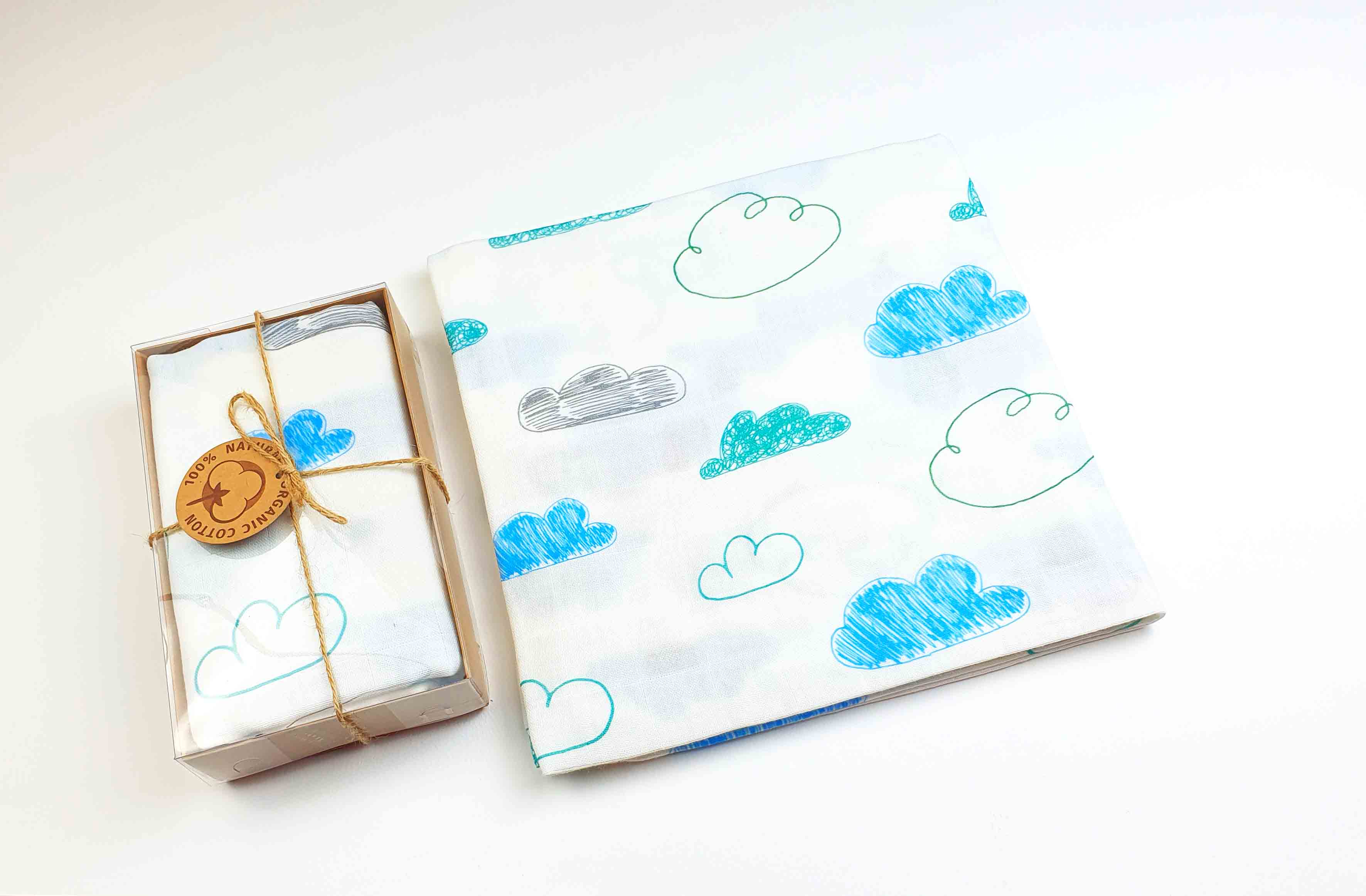 Muslin blanket. Print: Clouds.